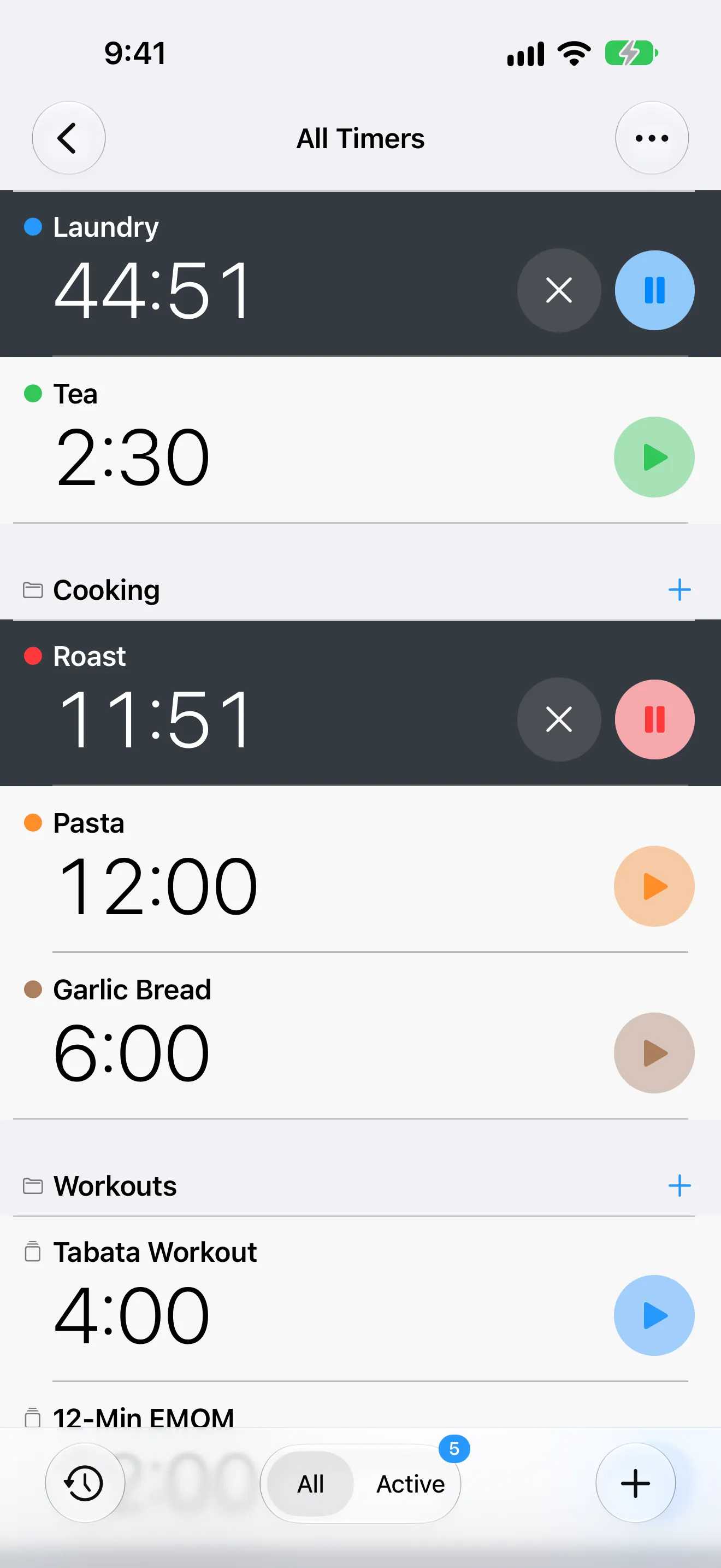 Screenshot of Timer+ showing all timers, with a running laundry timer and folders for cooking and workouts.