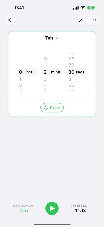 Timer Teh siap dimulai, dengan roda durasi pada 2 menit 30 detik, tombol suara Piano, pengulangan 1 kali, tombol putar, dan Akhir Timer 11.42.