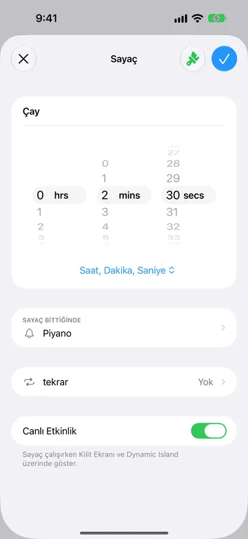 Çay adlı sayacın düzenleyicisi: 0 saat, 2 dakika, 30 saniyeye ayarlı, çarkların altında Saat, Dakika, Saniye biçim menüsü, Sayaç Bittiğinde Piyano, tekrar Yok olarak ayarlı ve Canlı Etkinlik anahtarı açık.