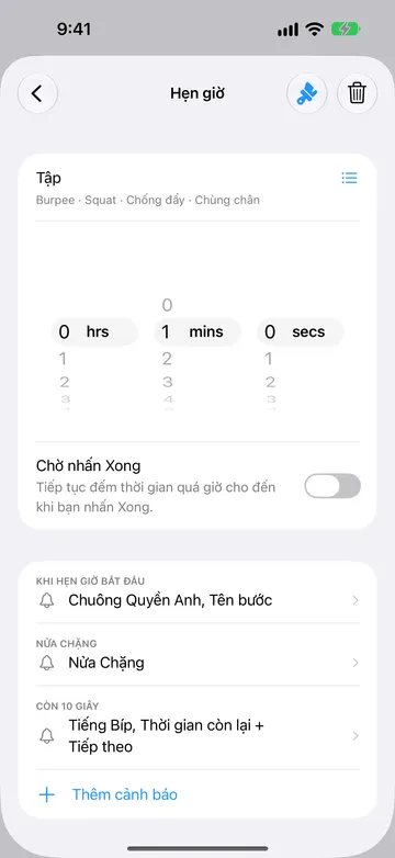 Trình chỉnh sửa bước Hẹn giờ cho bước 1 phút tên Tập, với các tên lần lặp Burpee, Squat, Chống đẩy và Chùng chân dưới tên bước và biểu tượng danh sách bên cạnh. Chờ nhấn Xong đang tắt. Các cảnh báo là Khi hẹn giờ bắt đầu, Nửa Chặng và Còn 10 giây, tiếp theo là Thêm cảnh báo.