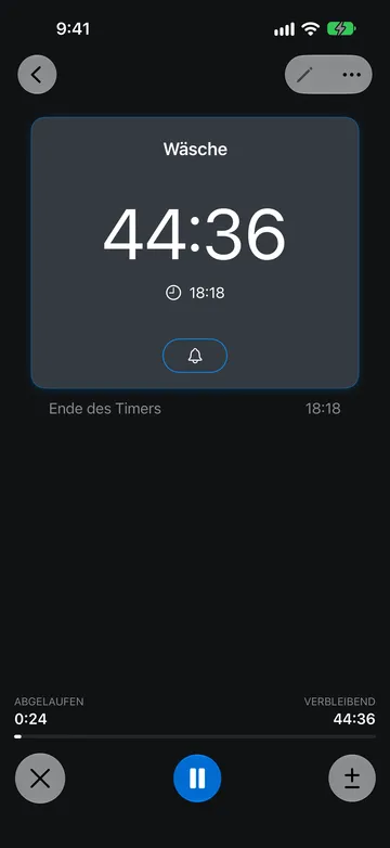 Laufender Timer Wäsche mit 44:36 verbleibend und Endzeit 18:18, 0:24 abgelaufen sowie den Tasten Abbrechen, Pausieren und Dauer ändern.