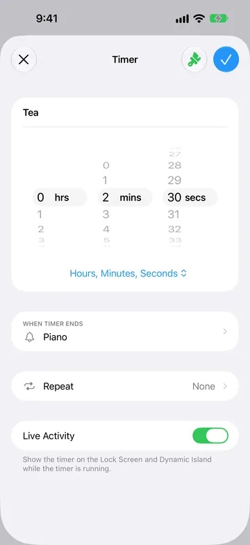 Timer editor for a timer named Tea, set to 0 hours, 2 minutes, 30 seconds, with the Hours, Minutes, Seconds format menu below the wheels, When Timer Ends set to Piano, Repeat set to None, and the Live Activity switch turned on.