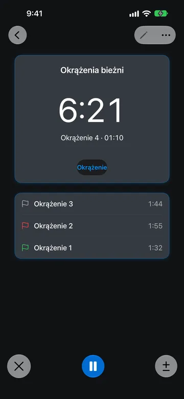 Stoper o nazwie Okrążenia bieżni z odczytem 6:21 i wierszem Okrążenie 4 · 01:10 pod nim. Lista okrążeń pokazuje Okrążenie 3 z czasem 1:44 i szarą flagą, Okrążenie 2 z czasem 1:55 i czerwoną flagą oraz Okrążenie 1 z czasem 1:32 i zieloną flagą.